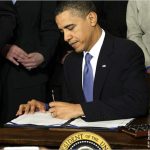 President Obama Signs ACA