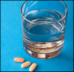 Prescription Drugs and Water Glass