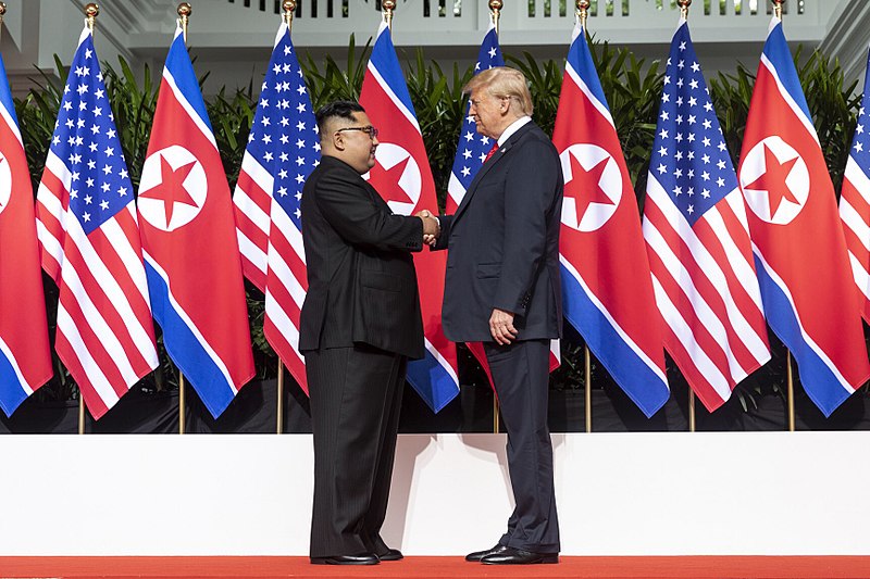800px-Kim_and_Trump_shaking_hands_at_the_red_carpet_during_the_DPRK–USA_Singapore_Summit