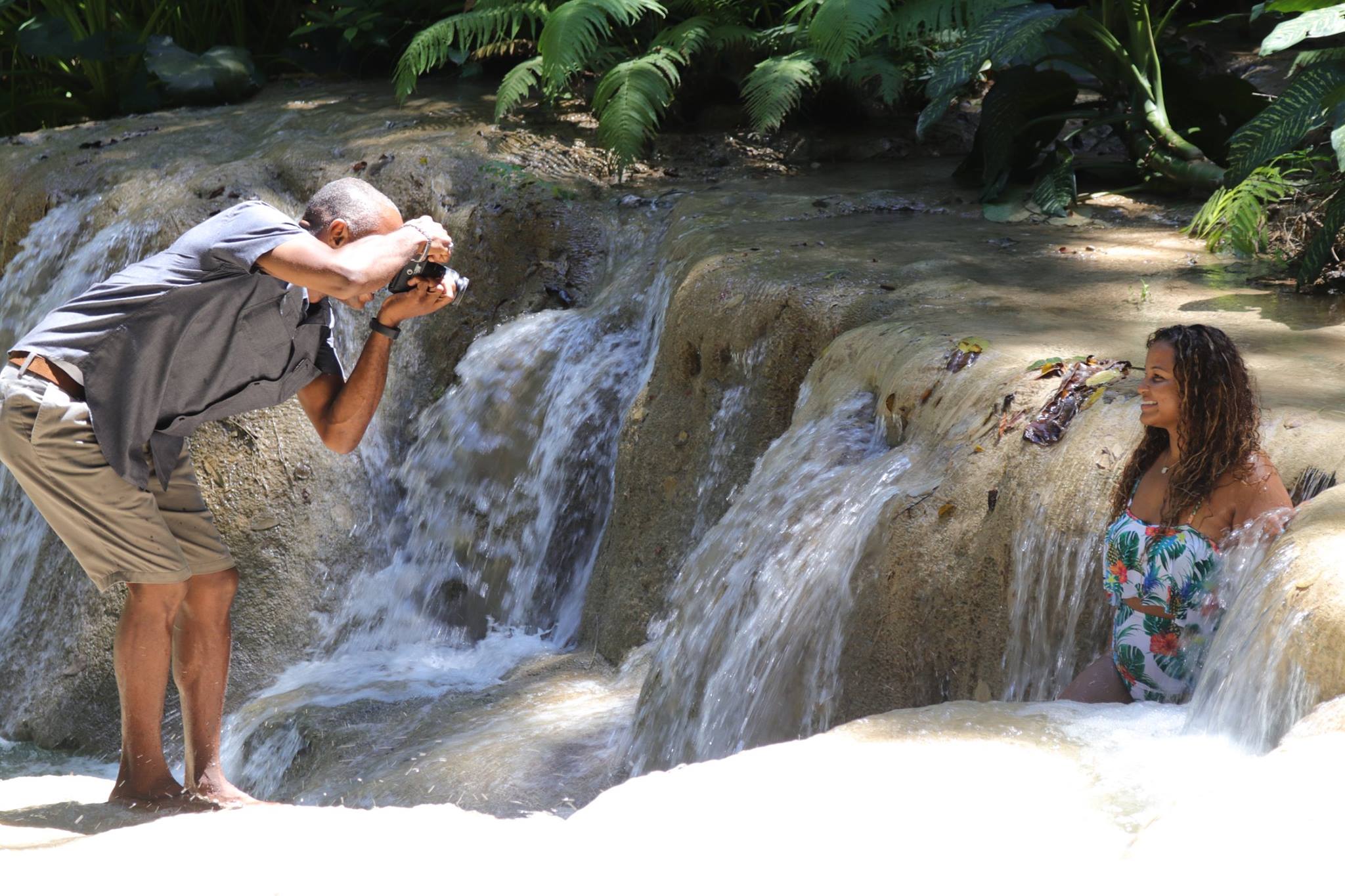 Jamaica Photographer Taking Photo of Women in Waterfall