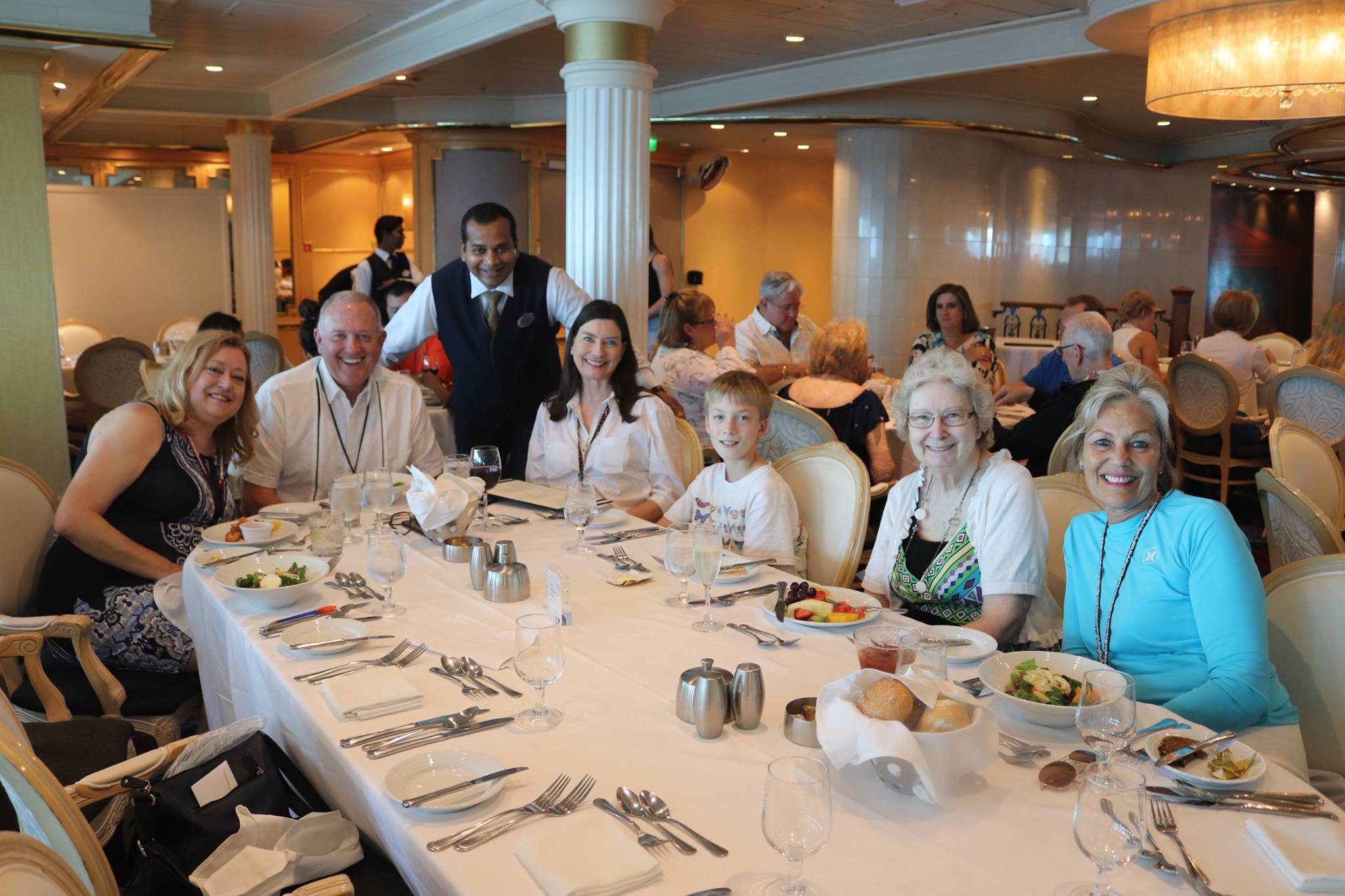 Family on Cruise Ship With Waiter