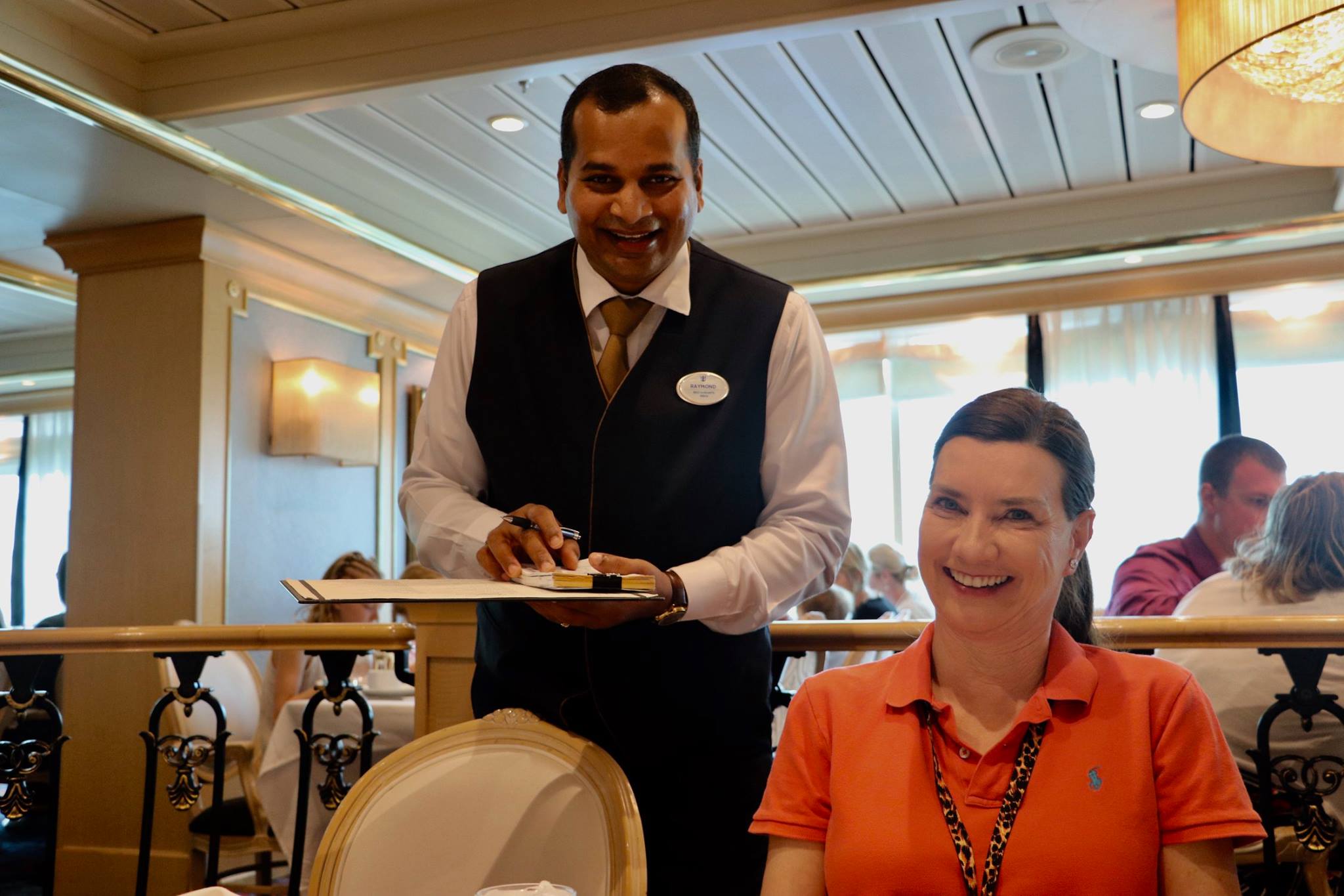 Debra Erickson and Raymond the Waiter on an Adventure of the Seas Royal Caribbean Cruise