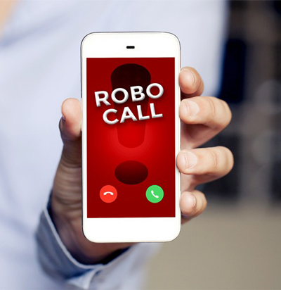 Robocall Sign on a Cell Phone Being Held Up By a Hand
