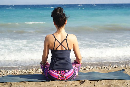 Meditation Woman in Front of Ocean
