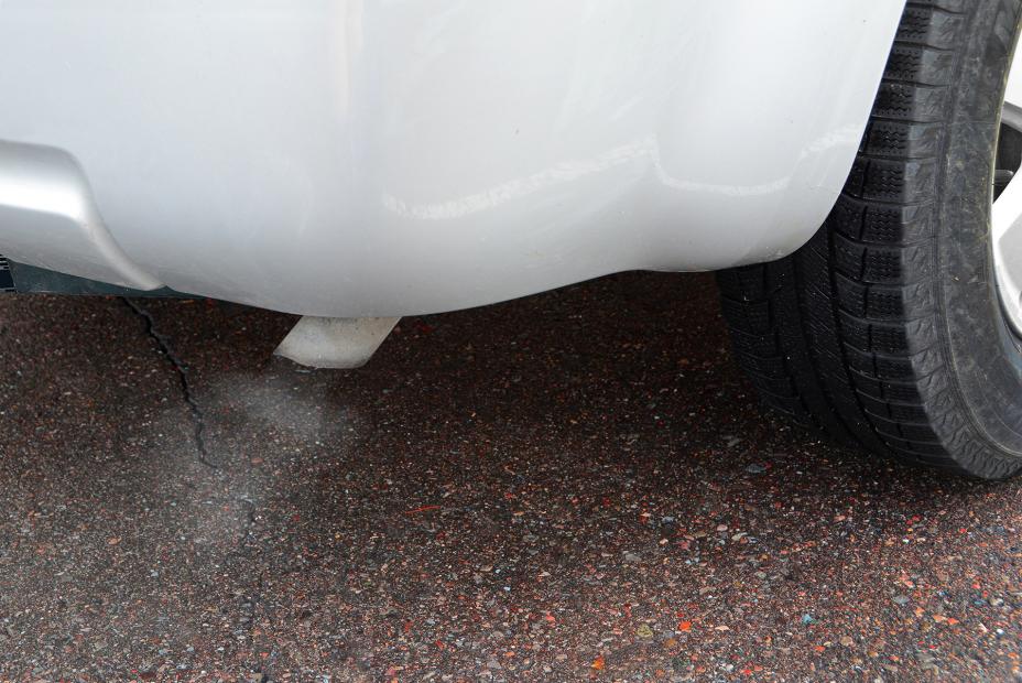 Tailpipe-exhaust From White Car