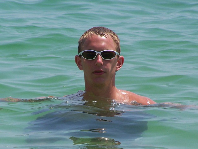 Swimming-Man in Lake Wearing Goggles