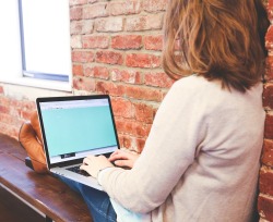 Computer Person Typing on Laptop