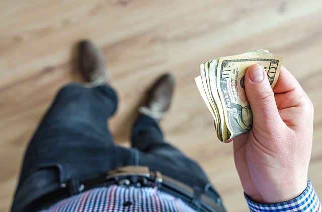 Money-Man Holding It in His Hand 3219298_640