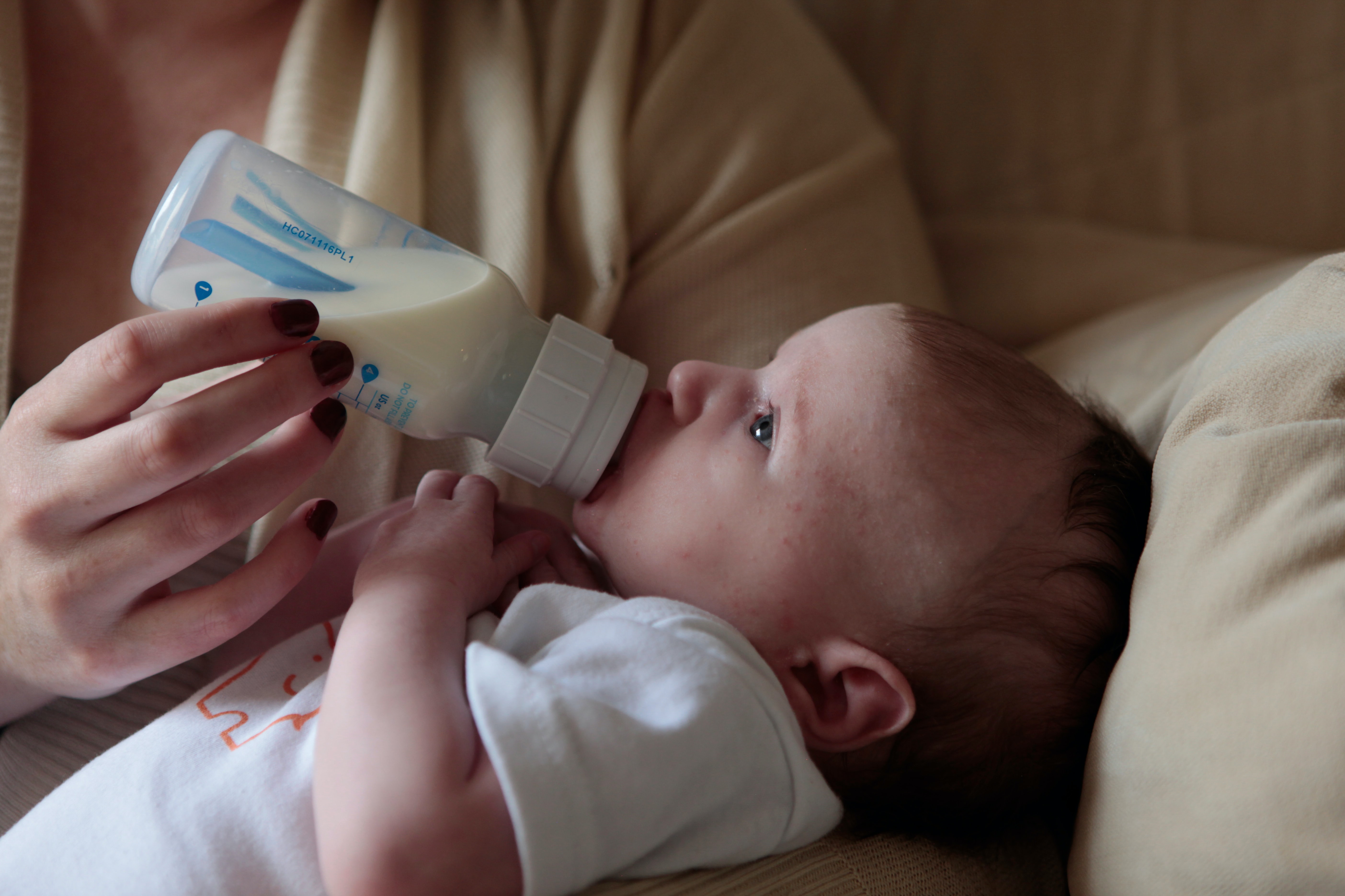 Baby Being Fed From a Bottle