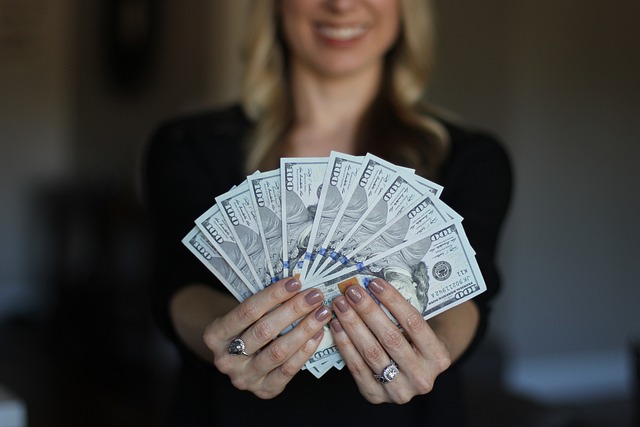 Money Being Displayed by a woman-3261425_640