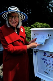 Rita Robison Voting at Ballot Box
