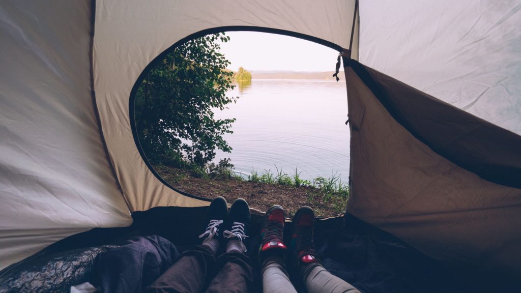 peaceful lakeside camping view from tent