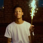 Use fireworks safety tips as America celebrates its 250th birthday man in white crew neck t shirt holding fire