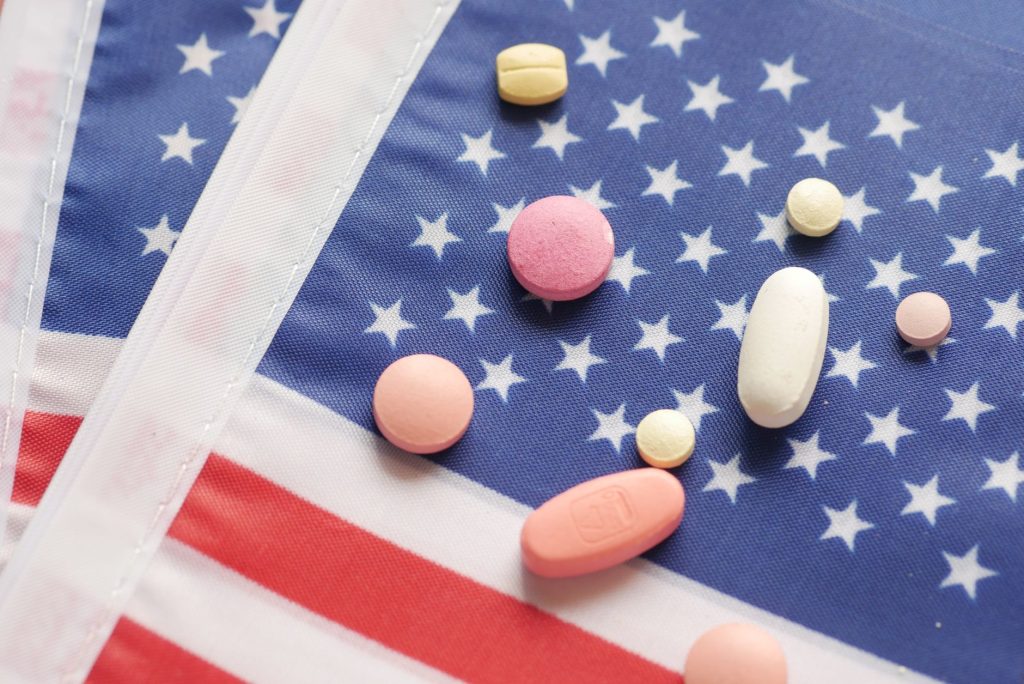 pills and tablets on an american flag