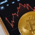 401(k)s without alternative assets perform better than pension plans with them, study finds close up of a bitcoin coin lying on a screen displaying a stock market chart